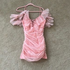 New with tag pink ruffle rouge dress. Med/large.